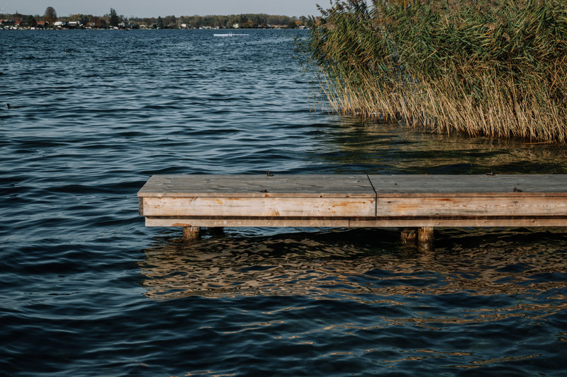 Eine vierschichtige Pyramide, bei der die dritte Schicht von oben in Dunkelgrün hervorgehoben ist.